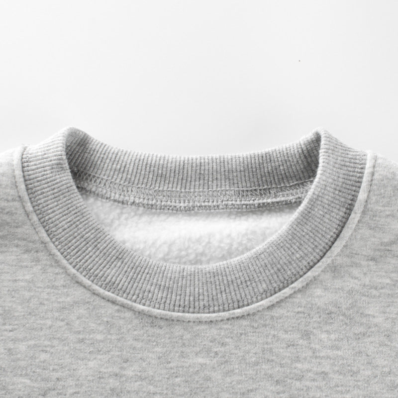 A cozy baby boy hoodie featuring cartoon patterns and slogans in blue and grey colors, perfect for winter wear.