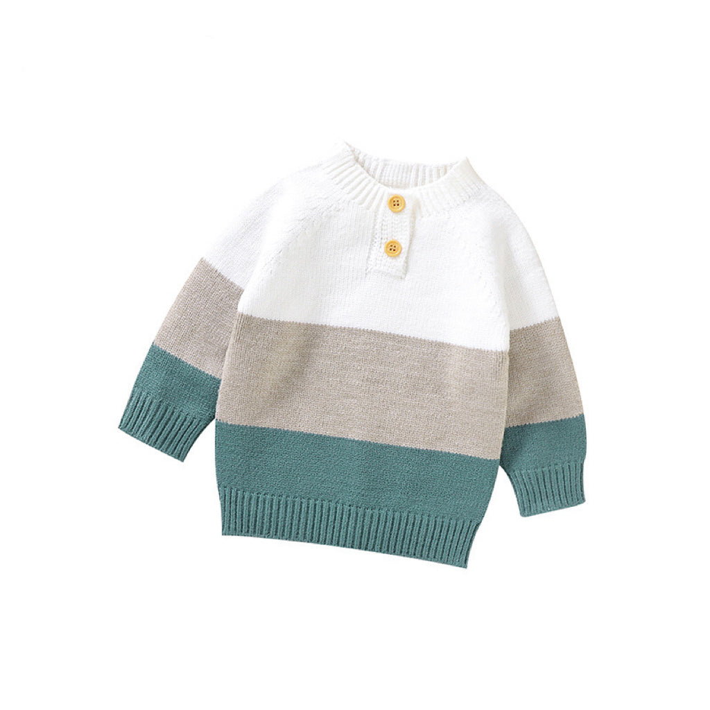 Baby boy wearing a stylish color block pullover with quarter-button design in blue and green, perfect for spring and autumn.
