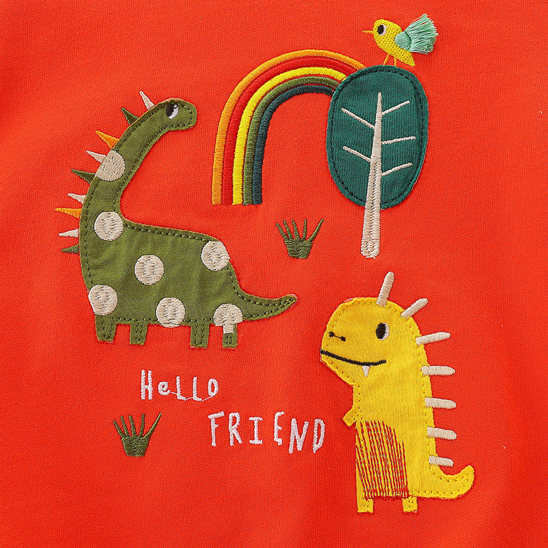 Baby boy wearing a cozy orange dinosaur embroidered pullover hoodie, showcasing a playful design perfect for toddlers.