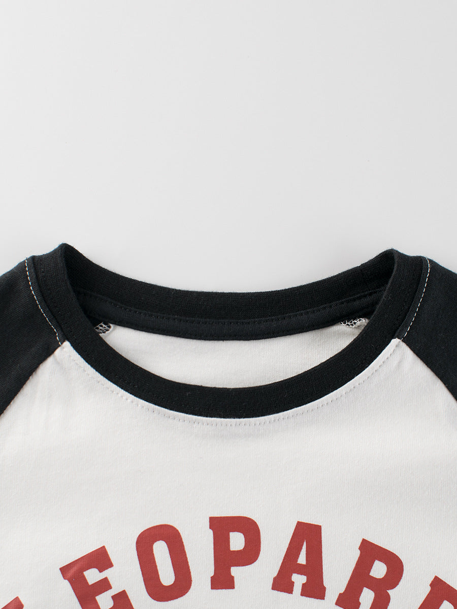 Baby boy's navy blue long sleeve shirt featuring leopard cartoon and letters print, made from soft cotton material.