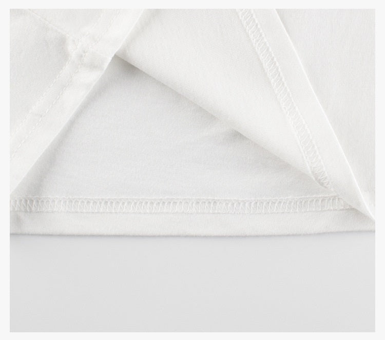 Baby boy's navy blue long sleeve shirt featuring leopard cartoon and letters print, made from soft cotton material.