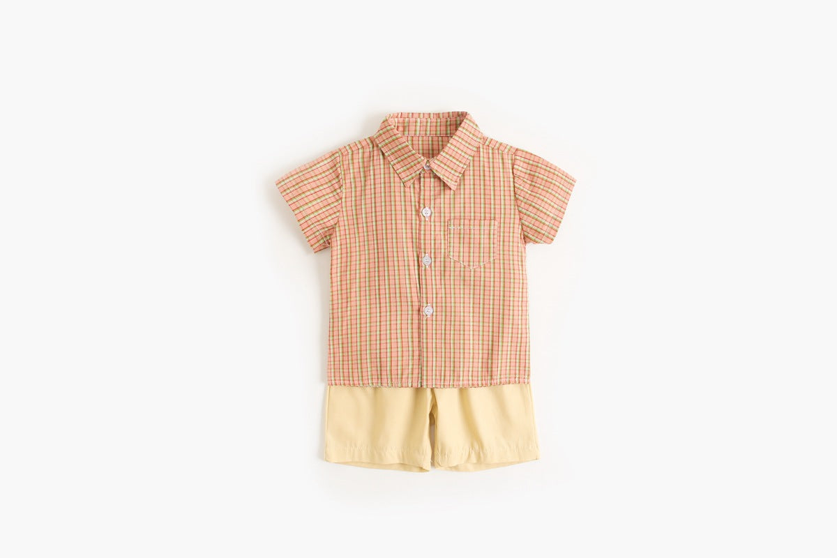 Baby boy wearing a stylish plaid pattern polo-neck shirt and shorts combo in vibrant colors.