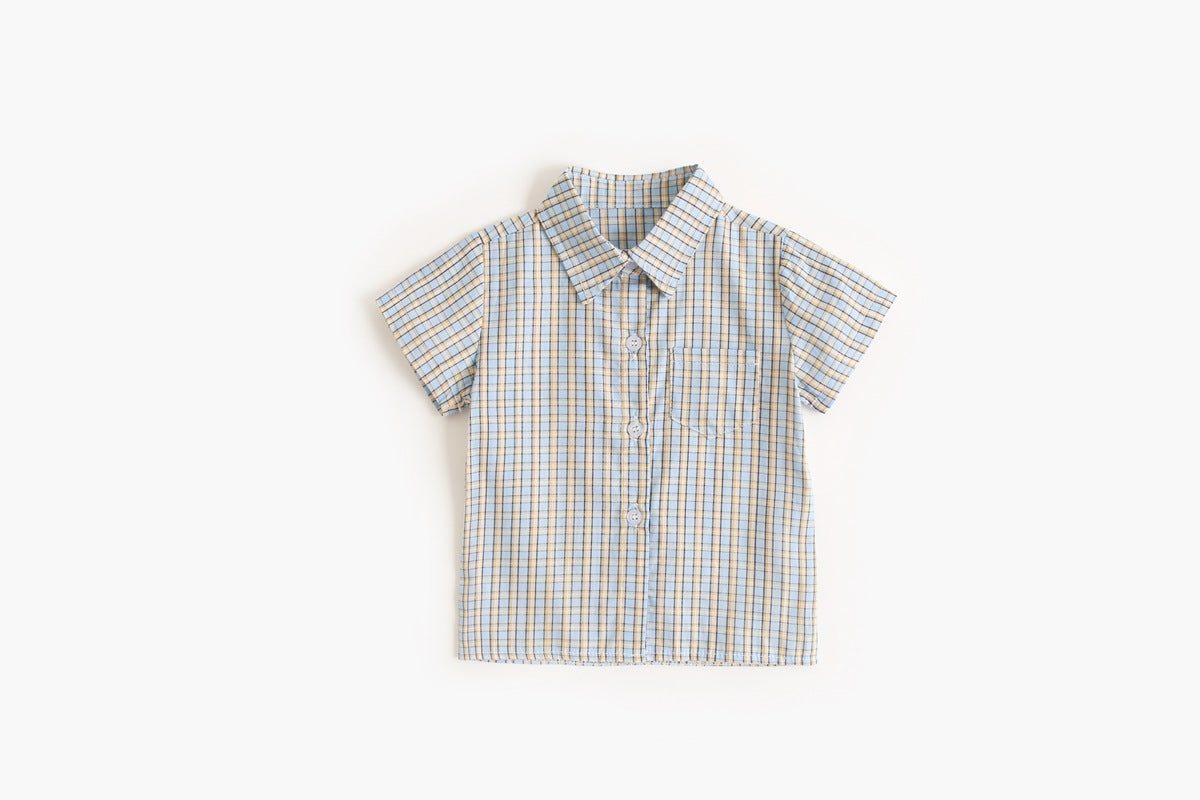 Baby boy wearing a stylish plaid pattern polo-neck shirt and shorts combo in vibrant colors.