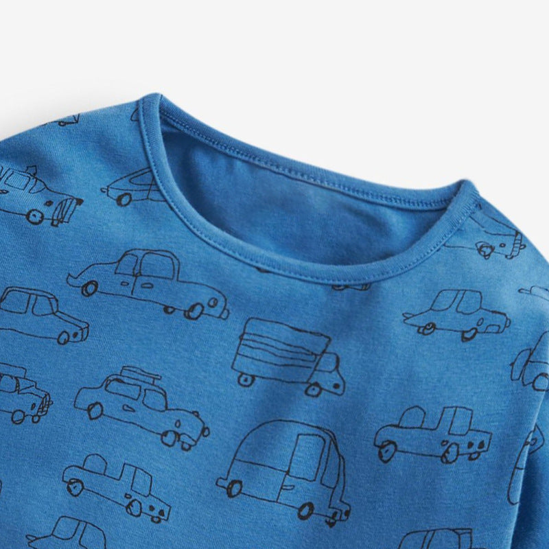 A solid blue long sleeve cotton shirt for baby boys featuring a playful print pattern, perfect for casual and semi-formal occasions.