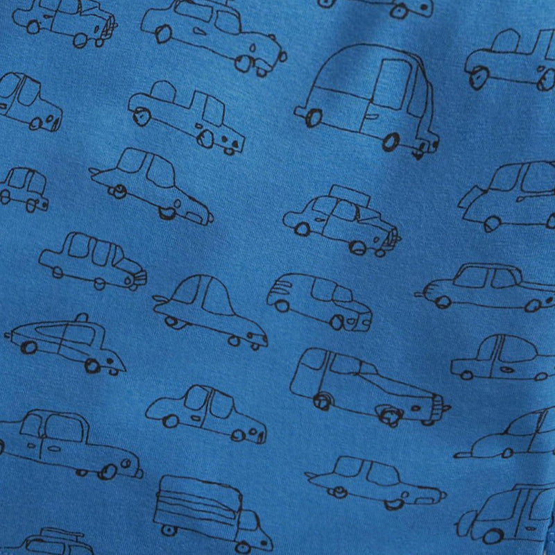 A solid blue long sleeve cotton shirt for baby boys featuring a playful print pattern, perfect for casual and semi-formal occasions.