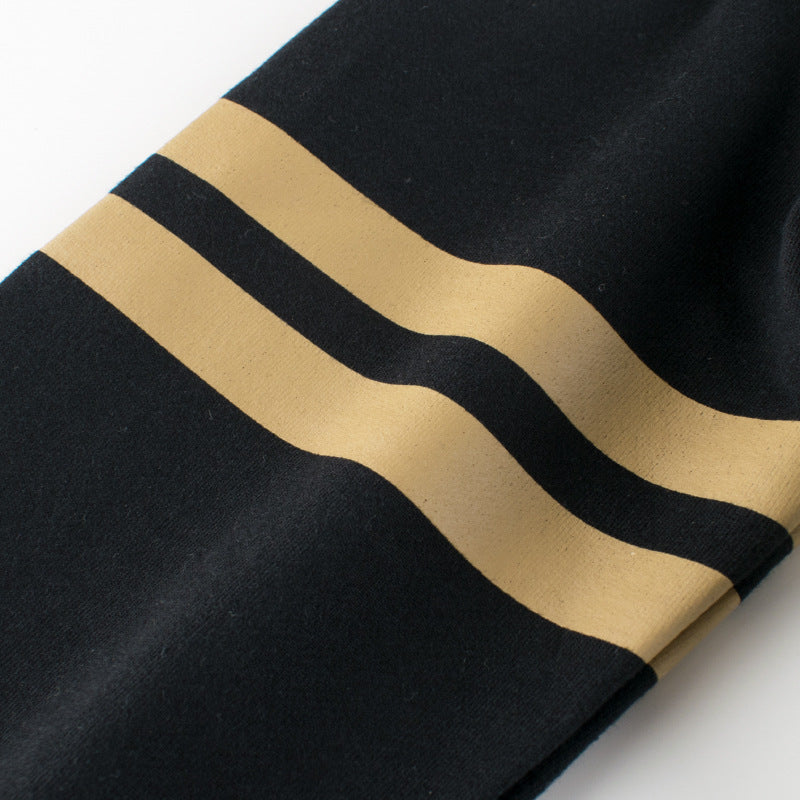 A grey baby boy pullover featuring a side striped pattern in contrasting colors, perfect for spring and autumn wear.