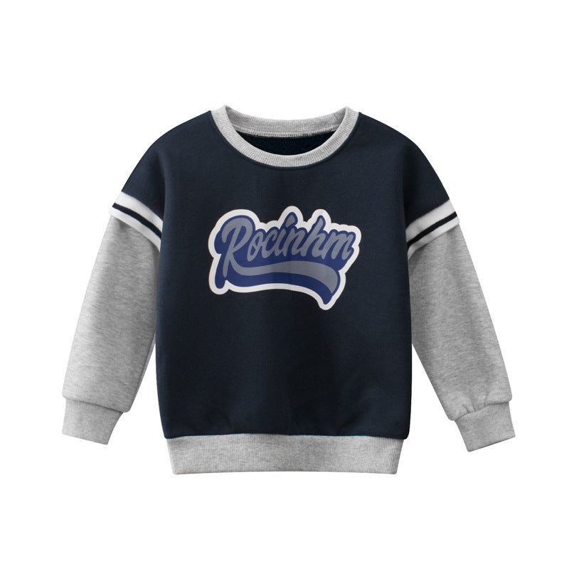 A cozy baby boy wearing a navy blue fleece hoodie with a trendy slogan pattern, perfect for chilly days.