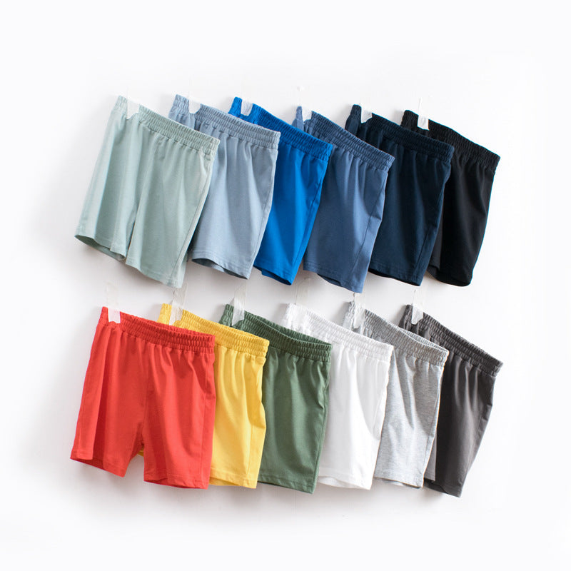 Baby boy solid color mid pants in various colors, made from soft cotton, perfect for summer wear.