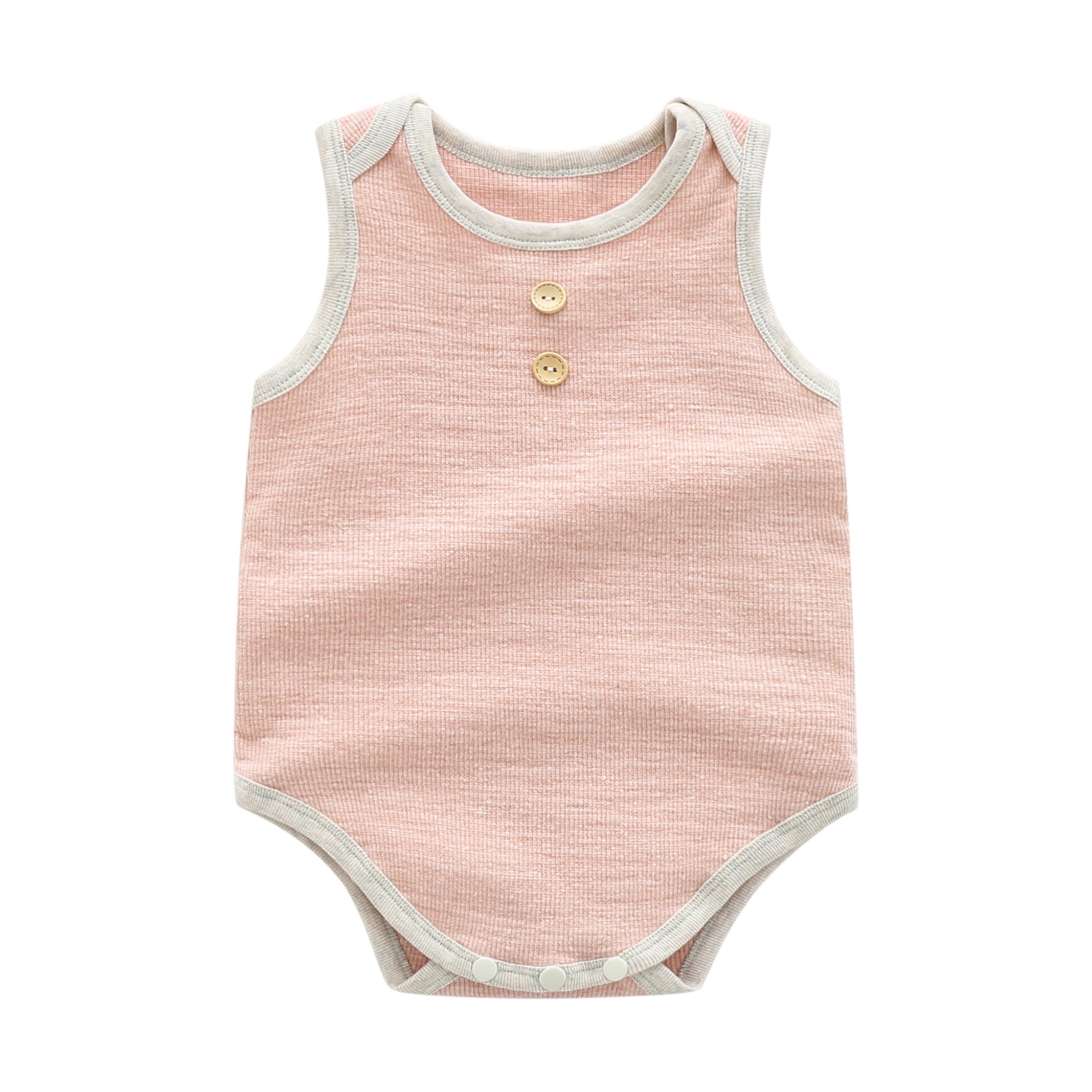 Baby boy wearing a solid color sleeveless onesie with neck buttons, showcasing vibrant colors and a round collar design.