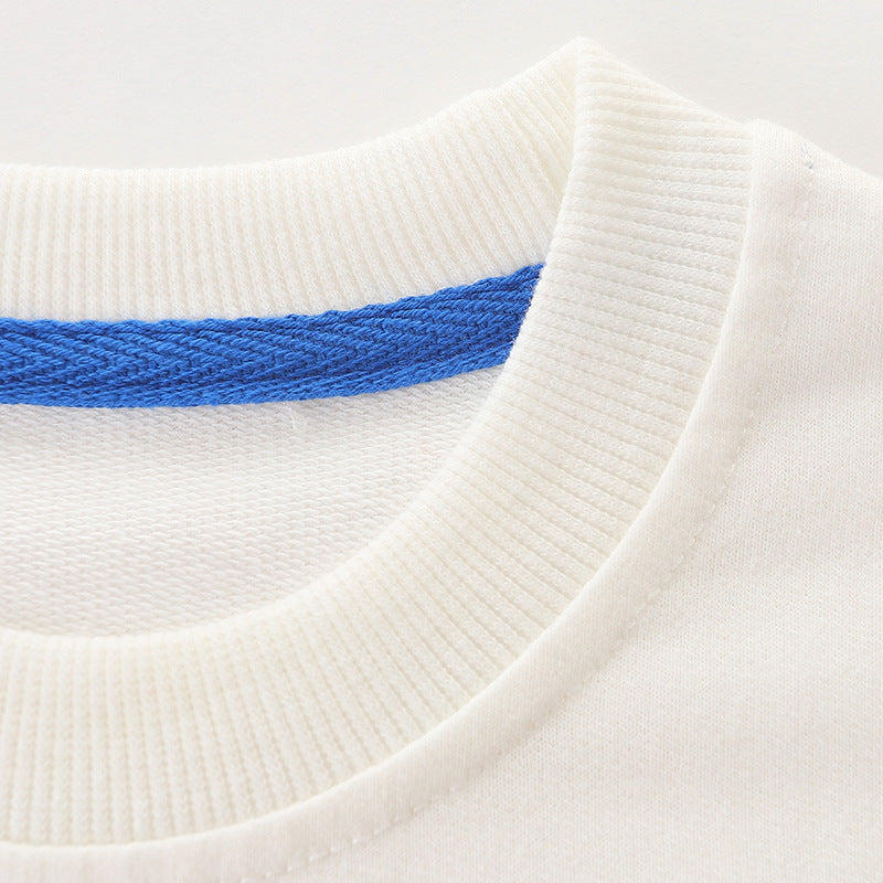 A cute baby boy wearing a sun graphic colorblock hoodie, showcasing a playful design in white and vibrant colors.