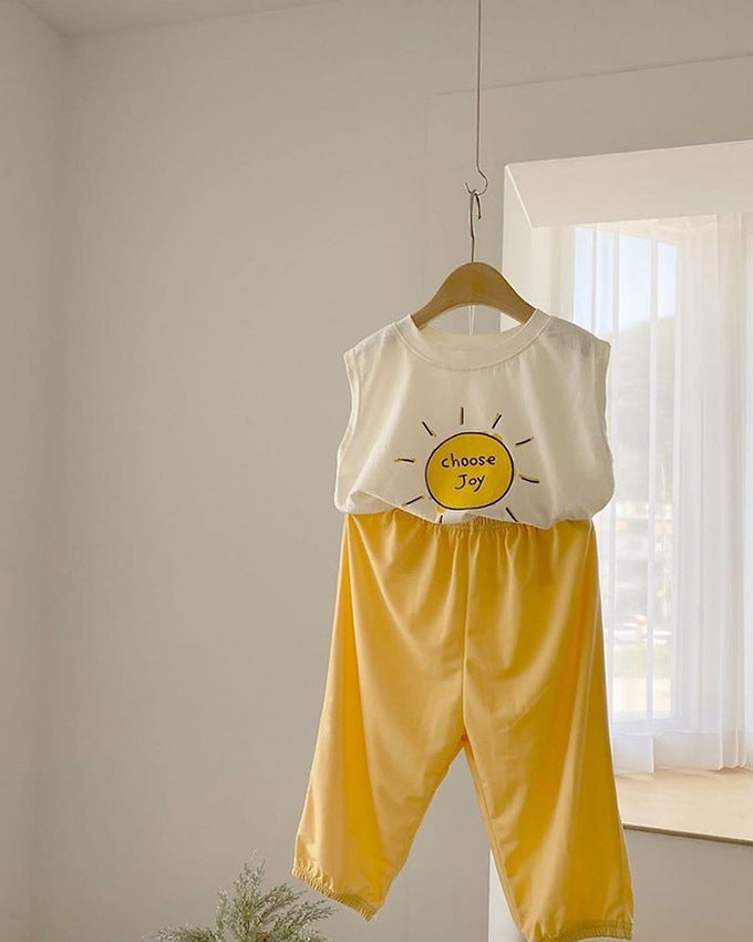 Baby boys and girls sleeveless round cotton top featuring a sun pattern print, available in white and khaki colors.