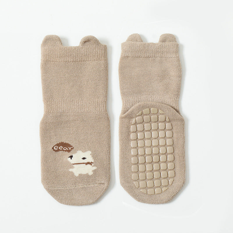 Cute baby socks featuring cartoon animal graphics with a non-slip design, perfect for toddlers.