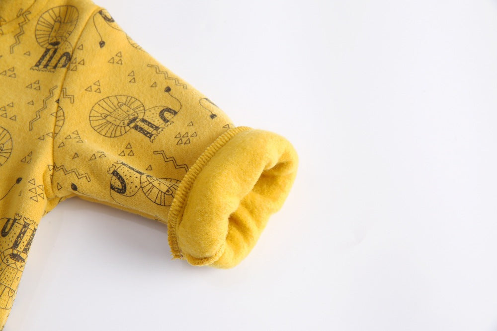 Baby wearing a cute cartoon animal romper with a matching hat, showcasing a playful design in yellow and khaki colors.