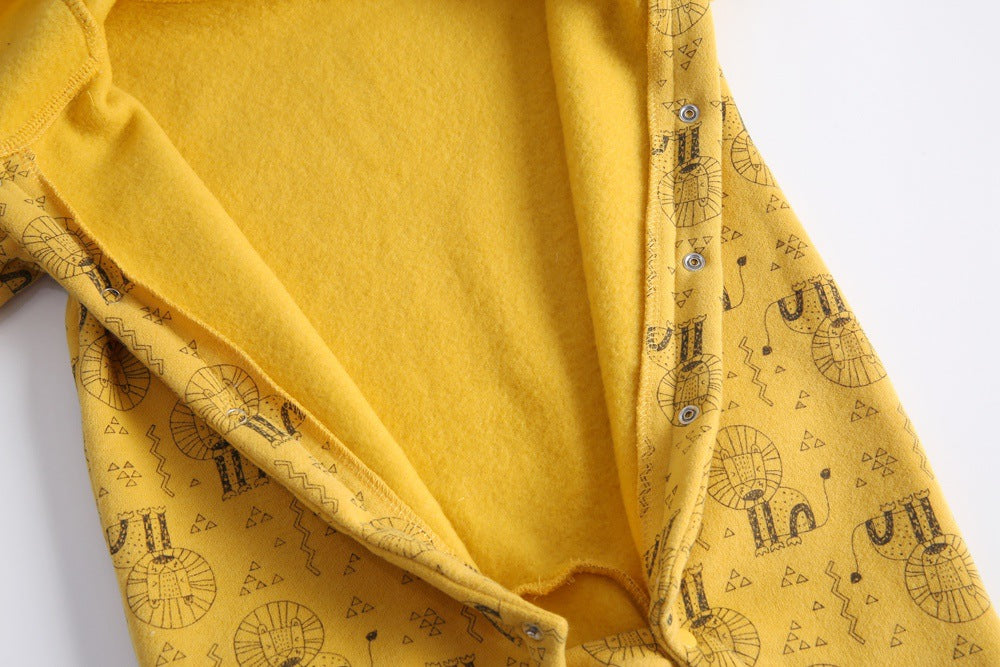 Baby wearing a cute cartoon animal romper with a matching hat, showcasing a playful design in yellow and khaki colors.