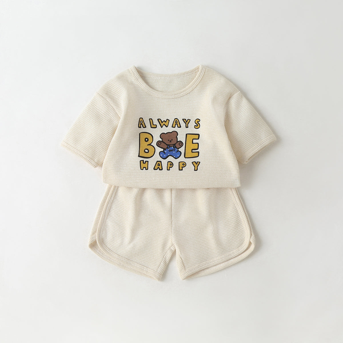 Adorable Baby Cartoon Bear & Slogan Pattern Waffle Fabric Tops Combo in blue and beige, perfect for summer wear.