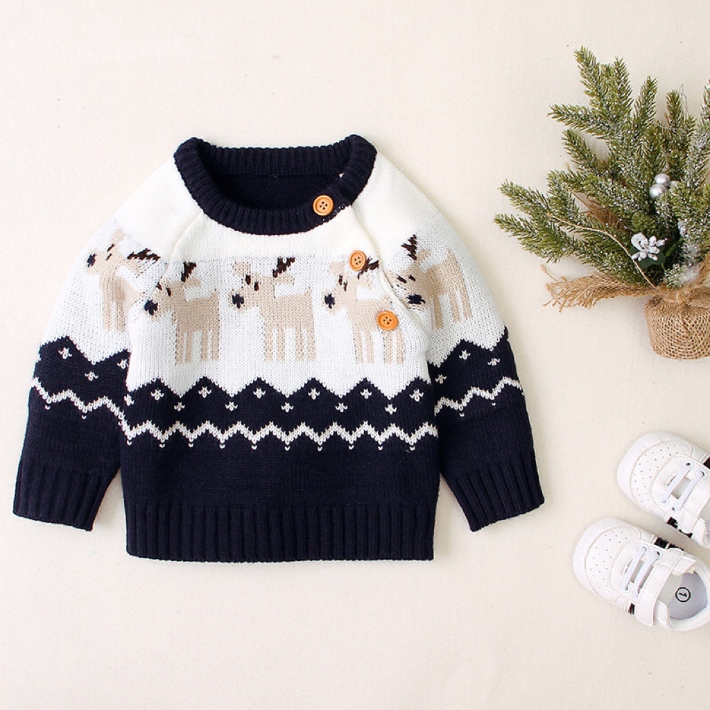 A cozy knitted baby sweater featuring a cartoon deer pattern and shoulder button design, available in red and navy blue.