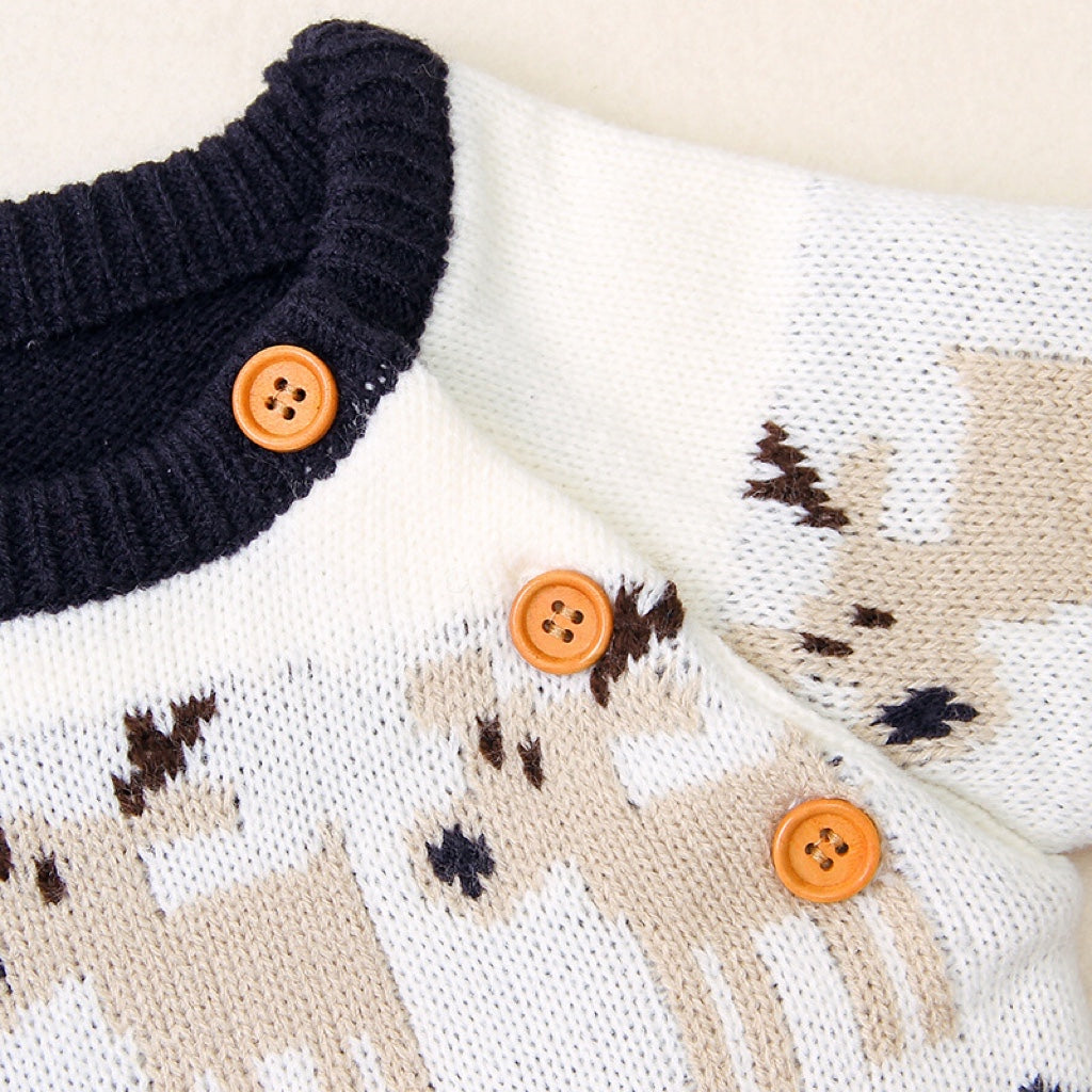 A cozy knitted baby sweater featuring a cartoon deer pattern and shoulder button design, available in red and navy blue.
