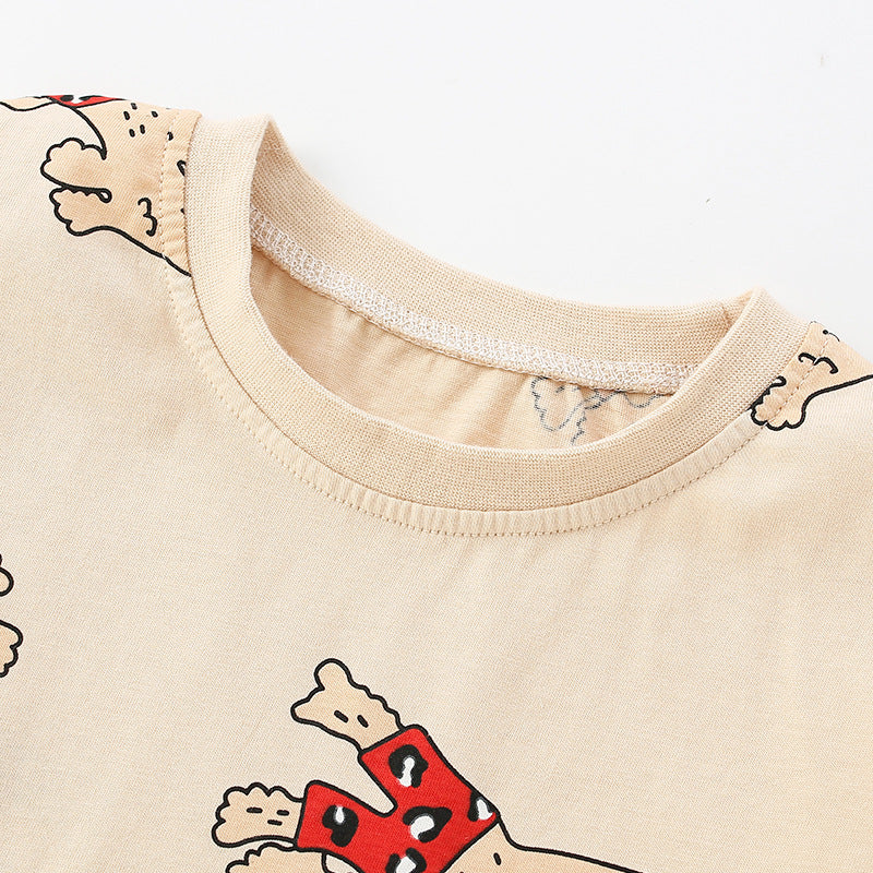 Baby shirt featuring a cartoon dog pattern in apricot color, perfect for autumn wear.