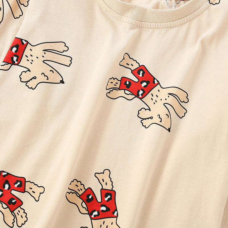 Baby shirt featuring a cartoon dog pattern in apricot color, perfect for autumn wear.