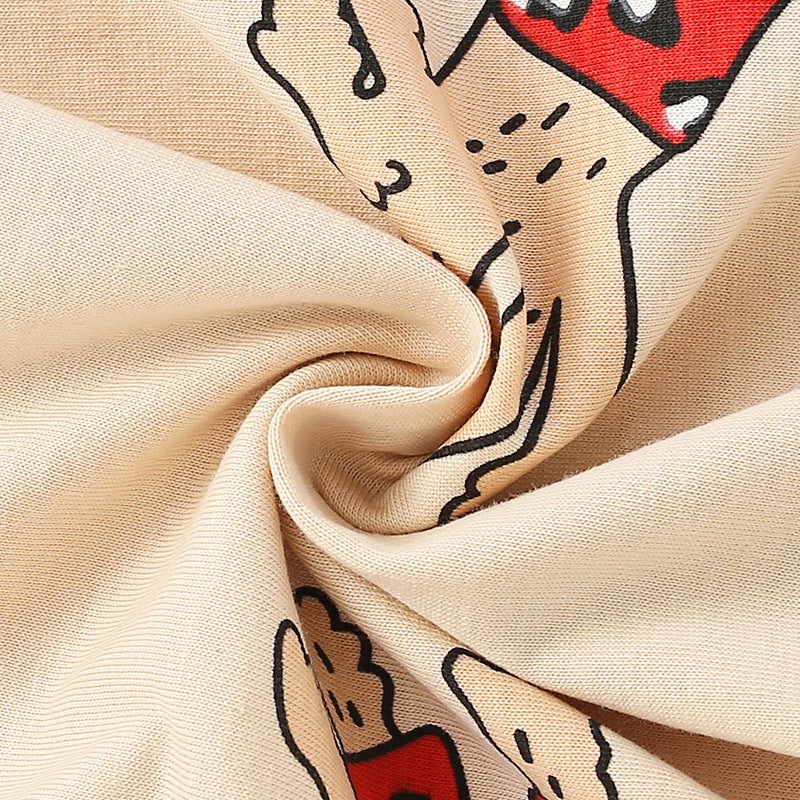 Baby shirt featuring a cartoon dog pattern in apricot color, perfect for autumn wear.