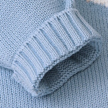 Baby wearing a cute cartoon fox graphic romper with long sleeves, featuring a triangle knitted design in blue and grey colors.