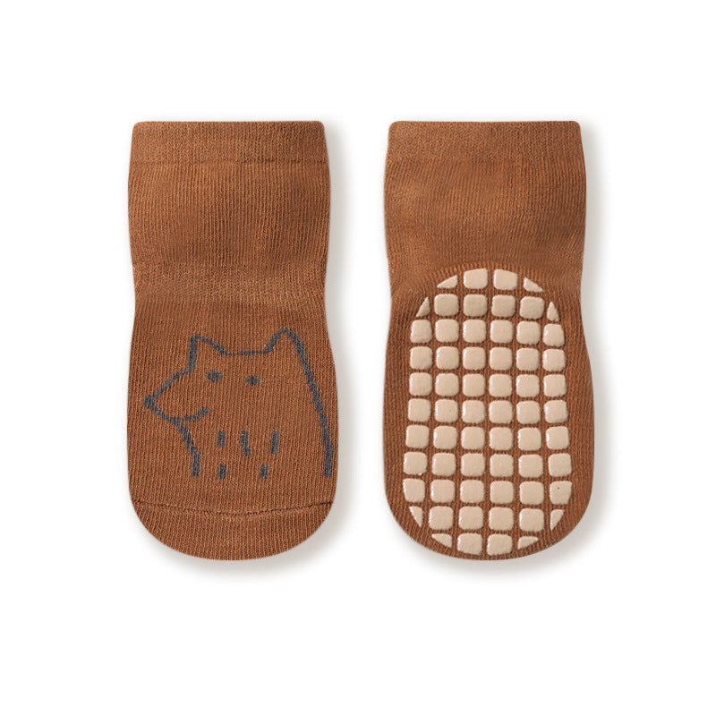 Colorful baby socks with cartoon graphics and non-slip soles, perfect for autumn wear.