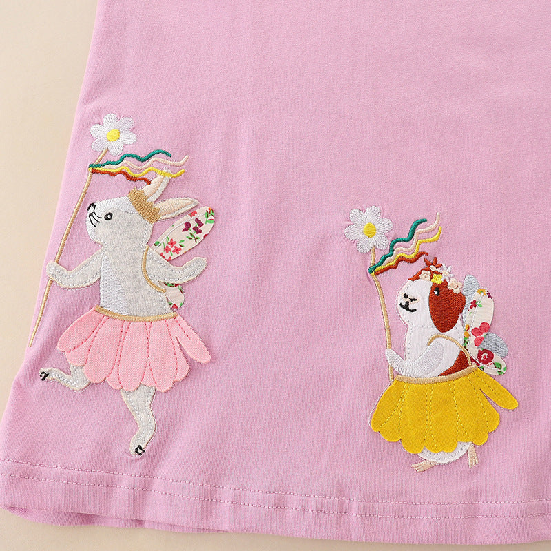 A cute baby girl wearing a pink sleeveless summer dress with cartoon patches, perfect for summer outings.