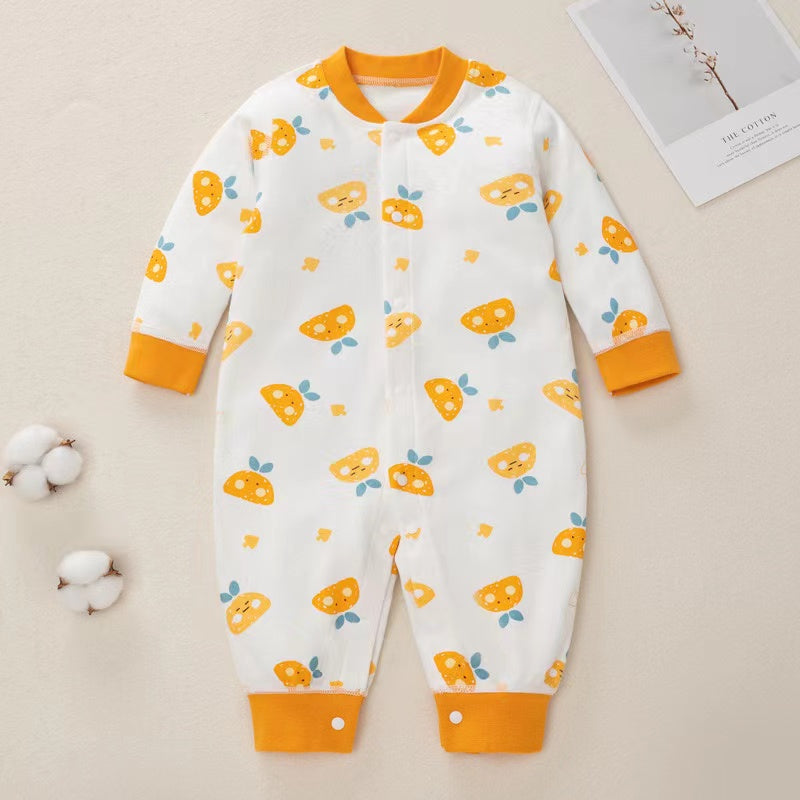 A colorful baby romper featuring a cartoon pattern, button front design, and long sleeves, made from soft cotton fabric.