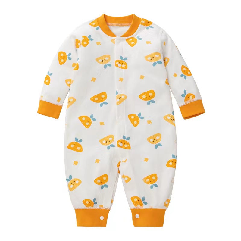 A colorful baby romper featuring a cartoon pattern, button front design, and long sleeves, made from soft cotton fabric.