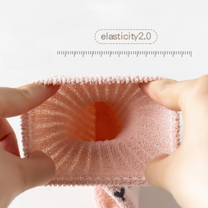 Baby Cartoon Pattern Coral Fleece Mid-Tube Socks in various colors with cute designs, perfect for keeping little feet warm.