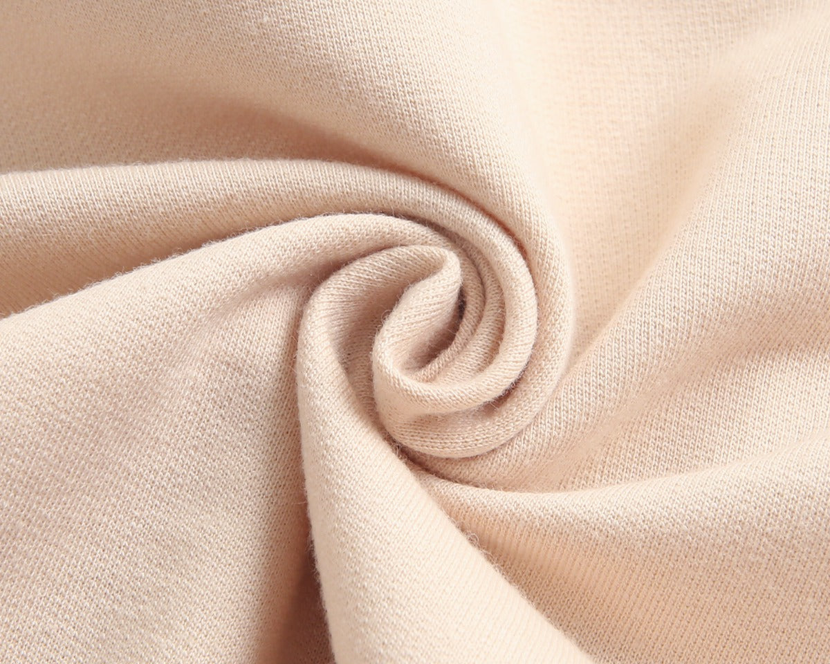 Bright and cozy baby onesie featuring a playful cartoon pattern and a matching hat, perfect for stylish comfort.