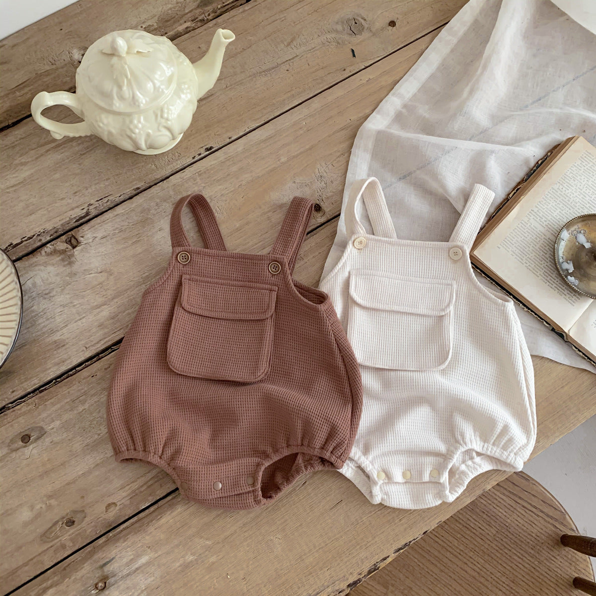 Baby Cartoon Print Tops with Waffle Fabric Strap Onesies Sets in various colors, showcasing vibrant cartoon designs and soft cotton material.