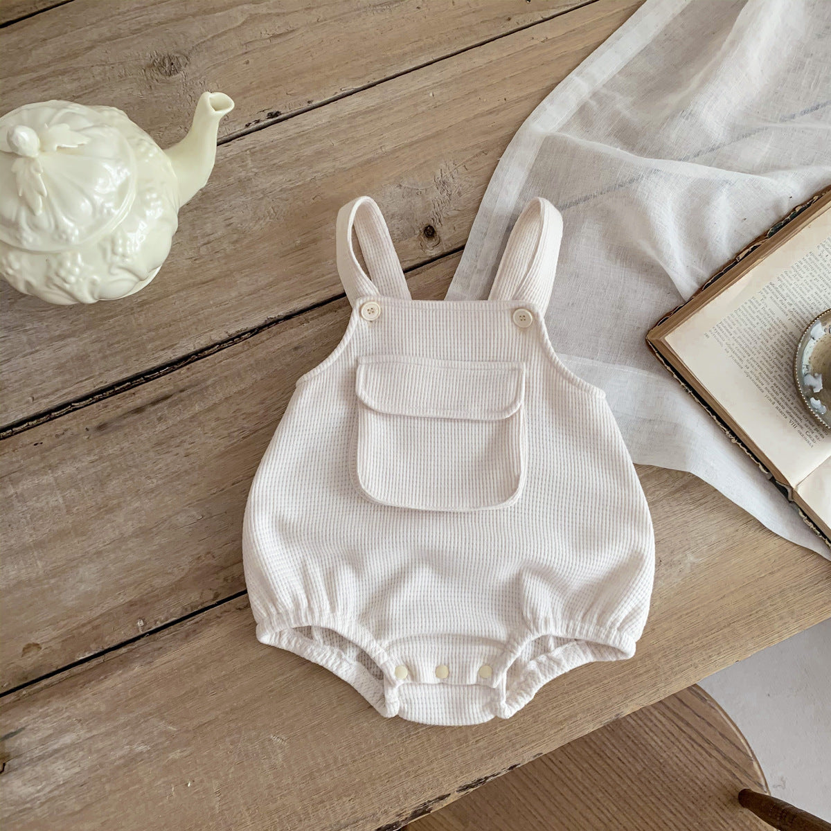 Baby Cartoon Print Tops with Waffle Fabric Strap Onesies Sets in various colors, showcasing vibrant cartoon designs and soft cotton material.