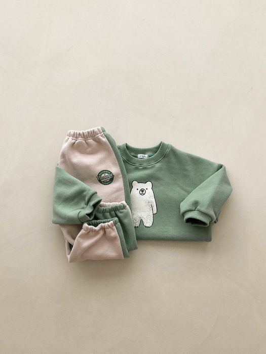 A stylish baby casual hoodie and trousers set in white and green, featuring cute animal and cartoon patterns, perfect for spring and autumn wear.