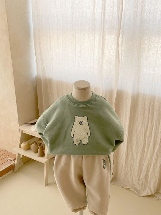 A stylish baby casual hoodie and trousers set in white and green, featuring cute animal and cartoon patterns, perfect for spring and autumn wear.