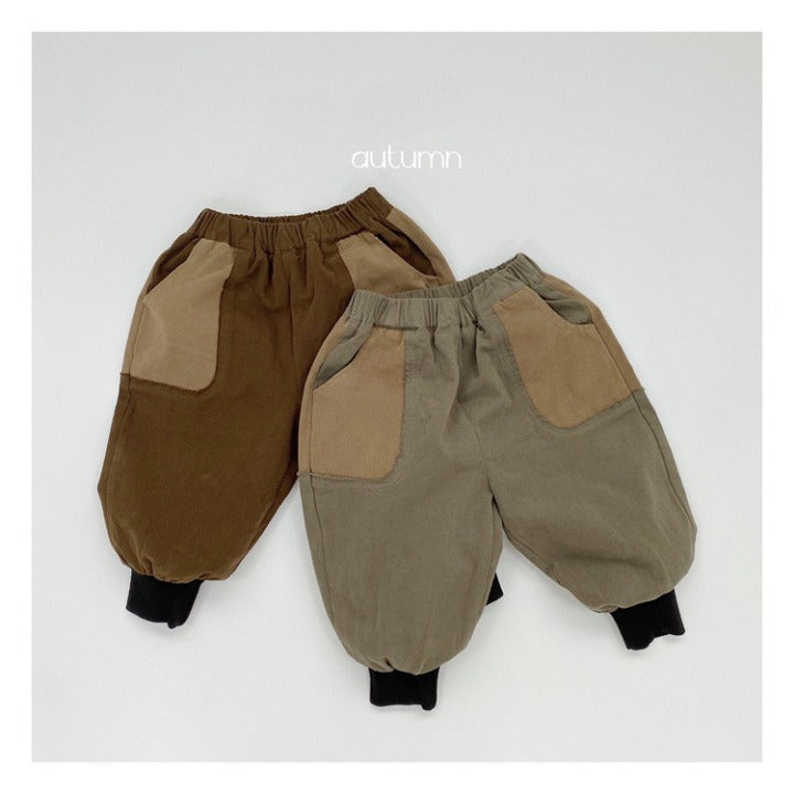 Baby Color Matching Pattern Lantern Trousers in green and coffee colors, featuring a stylish patchwork design suitable for both boys and girls.