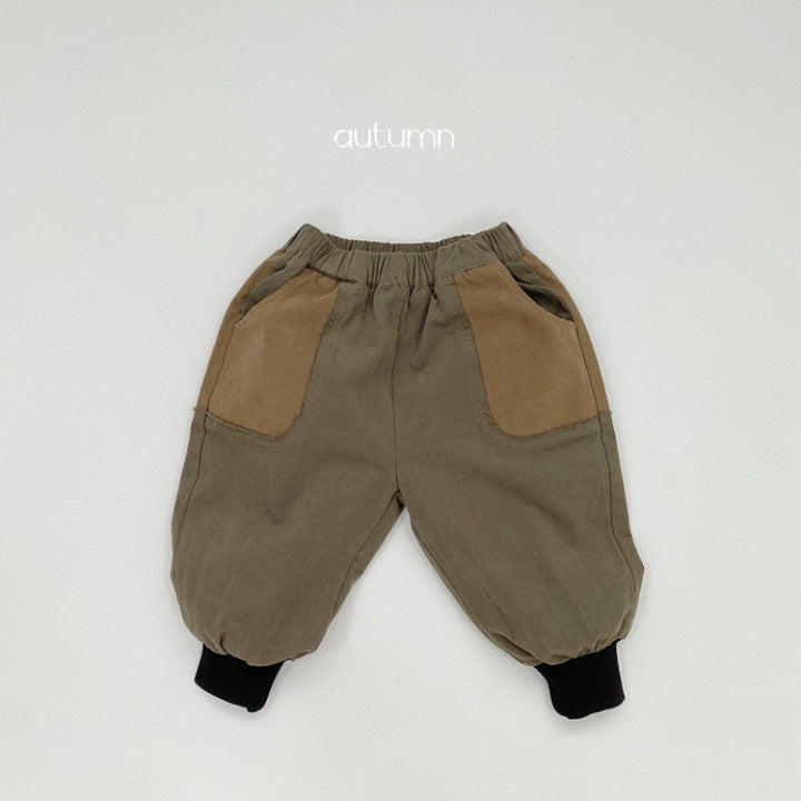 Baby Color Matching Pattern Lantern Trousers in green and coffee colors, featuring a stylish patchwork design suitable for both boys and girls.
