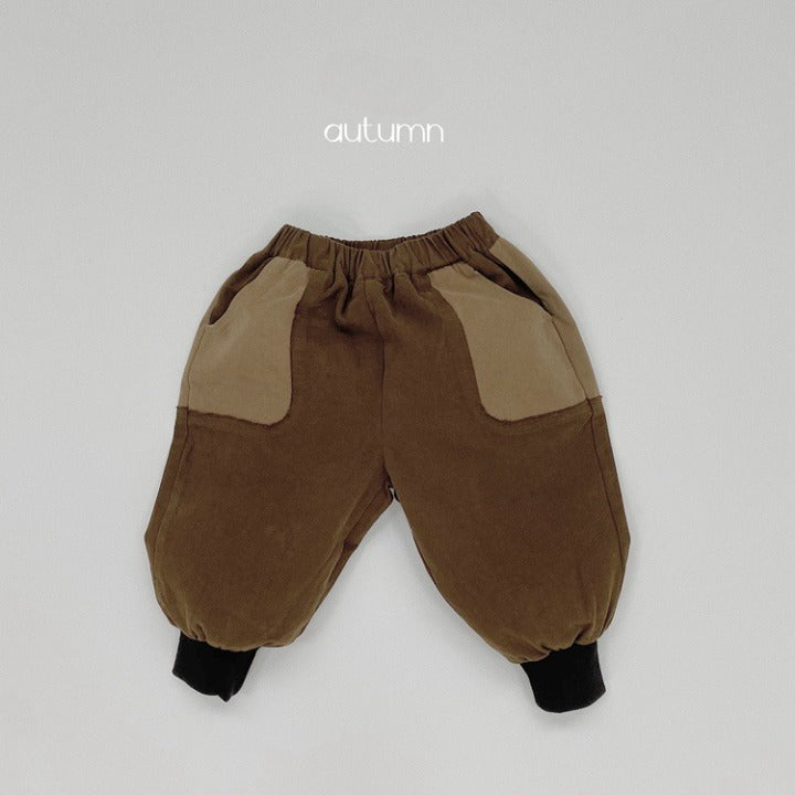 Baby Color Matching Pattern Lantern Trousers in green and coffee colors, featuring a stylish patchwork design suitable for both boys and girls.