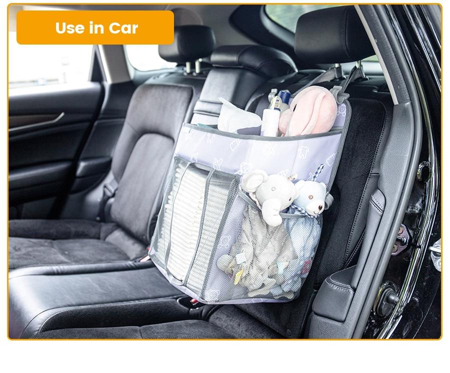 Baby Crib Hanging Storage Bag in cartoon pattern, designed for organizing diapers and baby essentials.