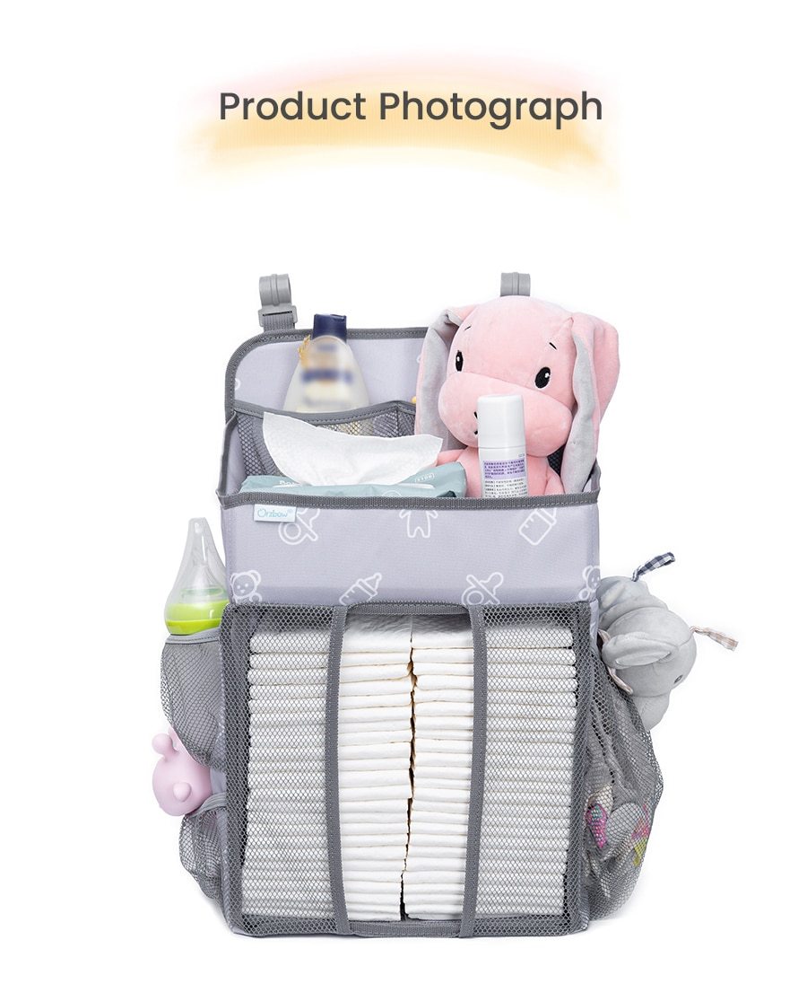 Baby Crib Hanging Storage Bag in cartoon pattern, designed for organizing diapers and baby essentials.