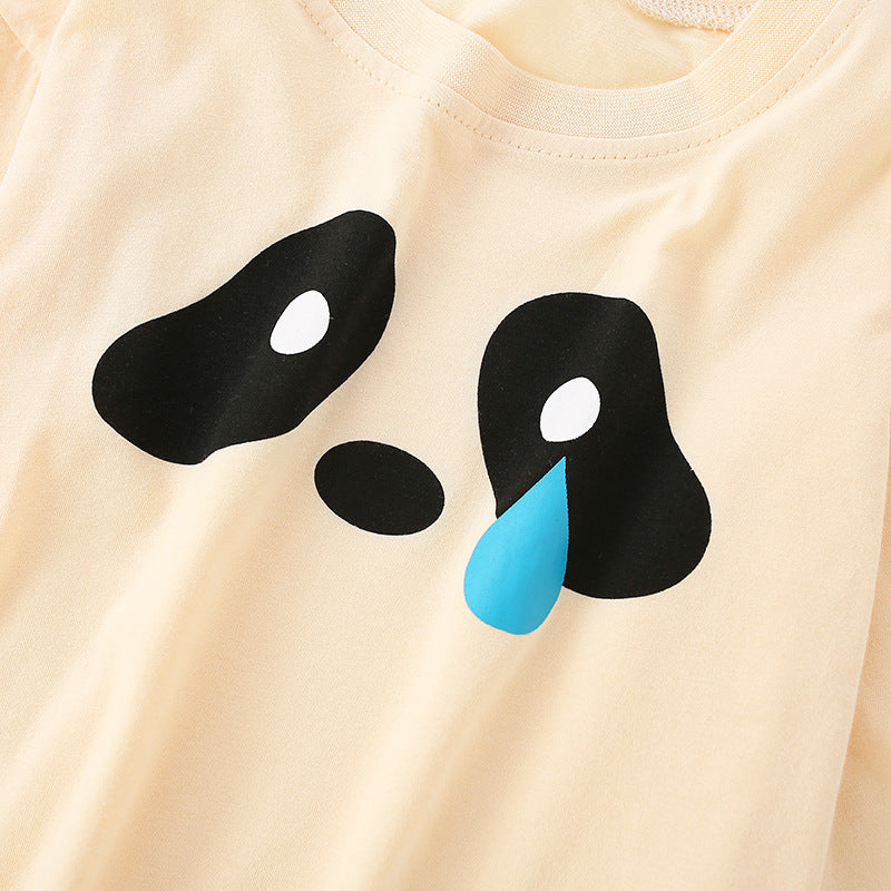 Baby wearing a cute pattern solid color long sleeve shirt in apricot, perfect for spring and autumn.