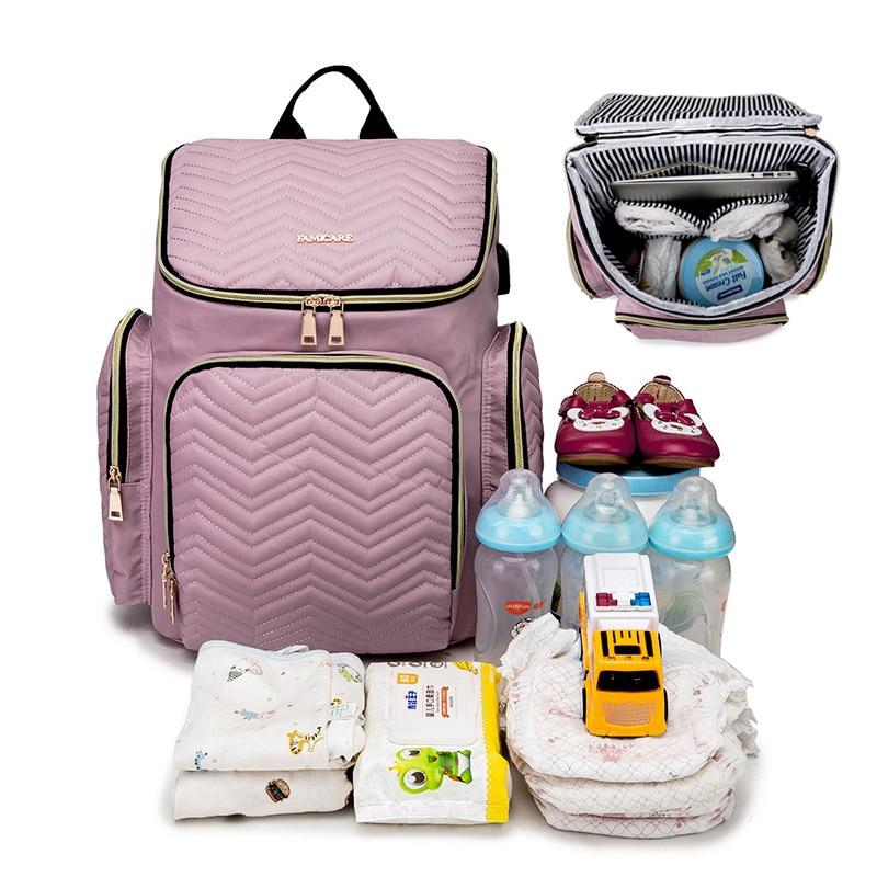 Stylish baby diaper bag backpack in black, khaki, and pale pinkish purple, featuring fashionable embroidery and a USB interface.