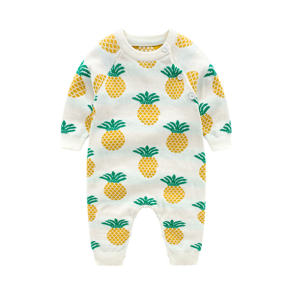 Baby romper featuring a playful dinosaur and pineapple pattern with shoulder button design, made from soft cotton fabric.