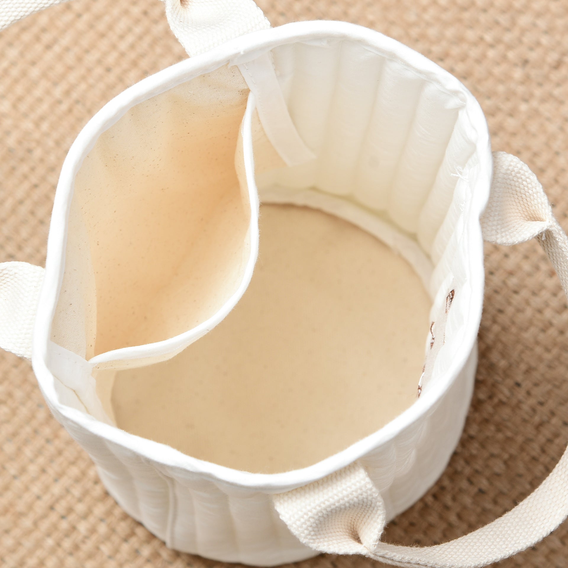 Stylish Baby Embroidered Pattern Mommy Handbag with multiple compartments for baby bottle storage, featuring adjustable straps and floral embroidery.