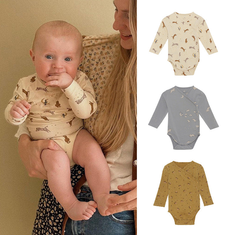 Baby bodysuit featuring floral and animal graphics with envelope collar design in various colors.