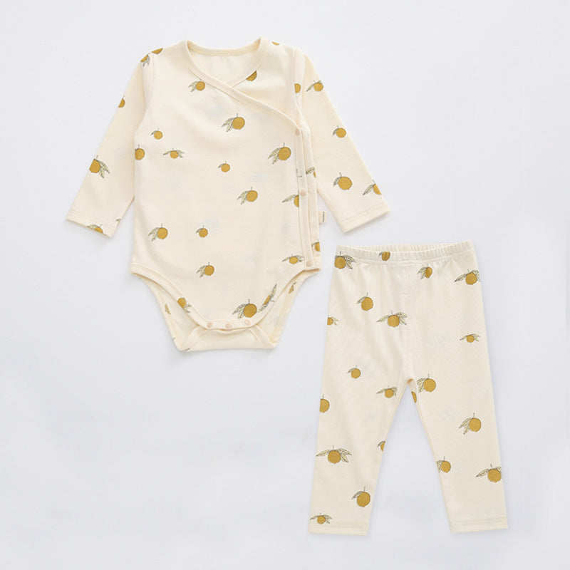 A cute baby outfit featuring a floral print pattern with a side buckle design, perfect for warm weather.