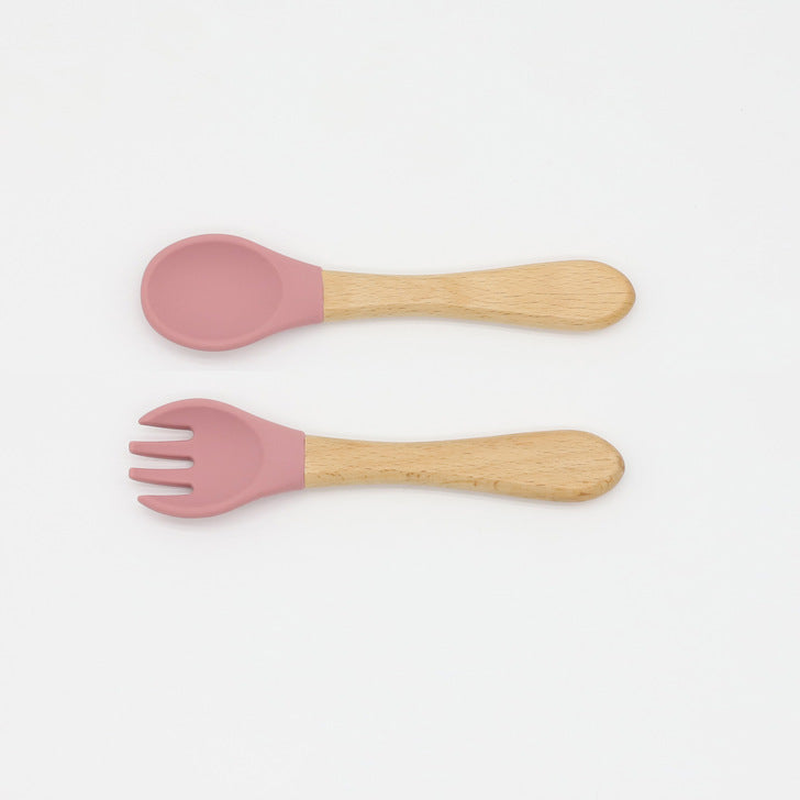 Baby Food Grade Wooden Handles Silicone Spoon Fork Cutlery set in various colors with soft silicone and wooden handles.