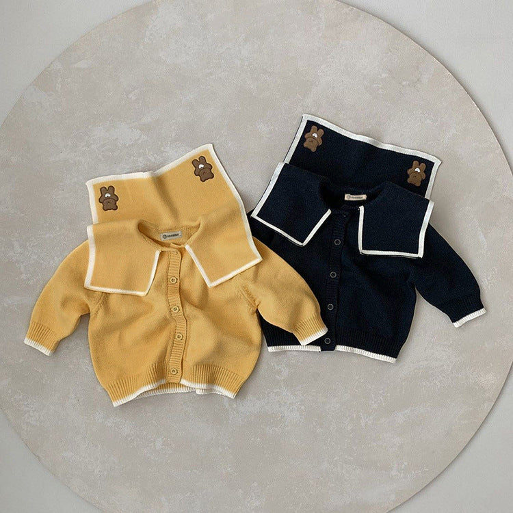 Baby Girl Bear Embroidery Cardigan featuring a single-breasted design and lapel collar in navy blue and yellow colors.