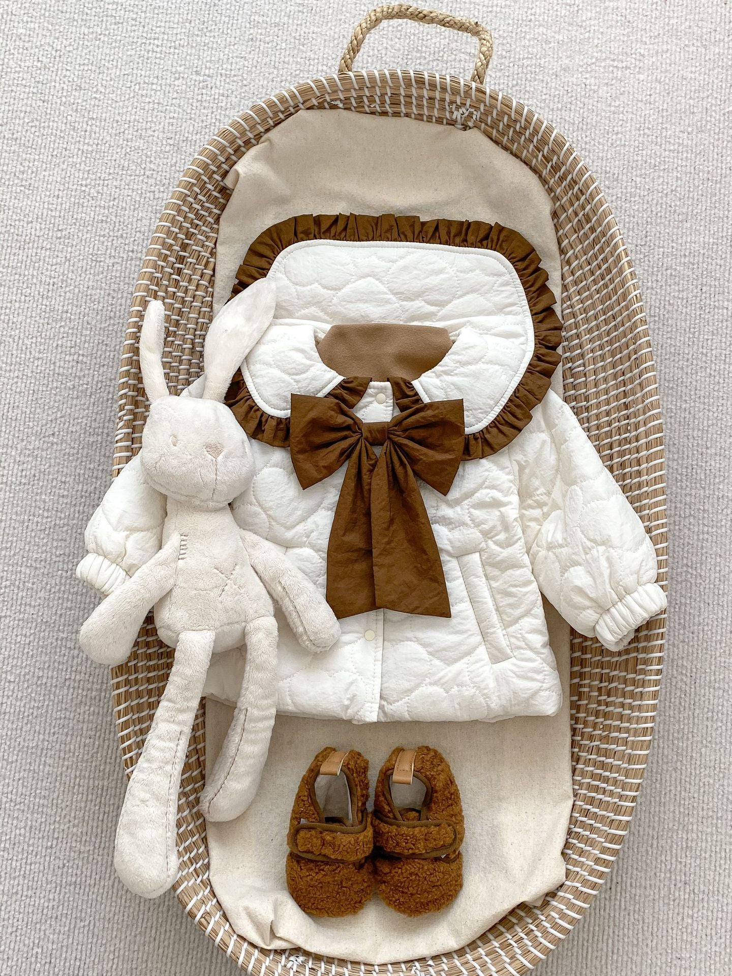 Baby girl beige cardigan coat with bow tie design, thickened long sleeves, perfect for winter wear.