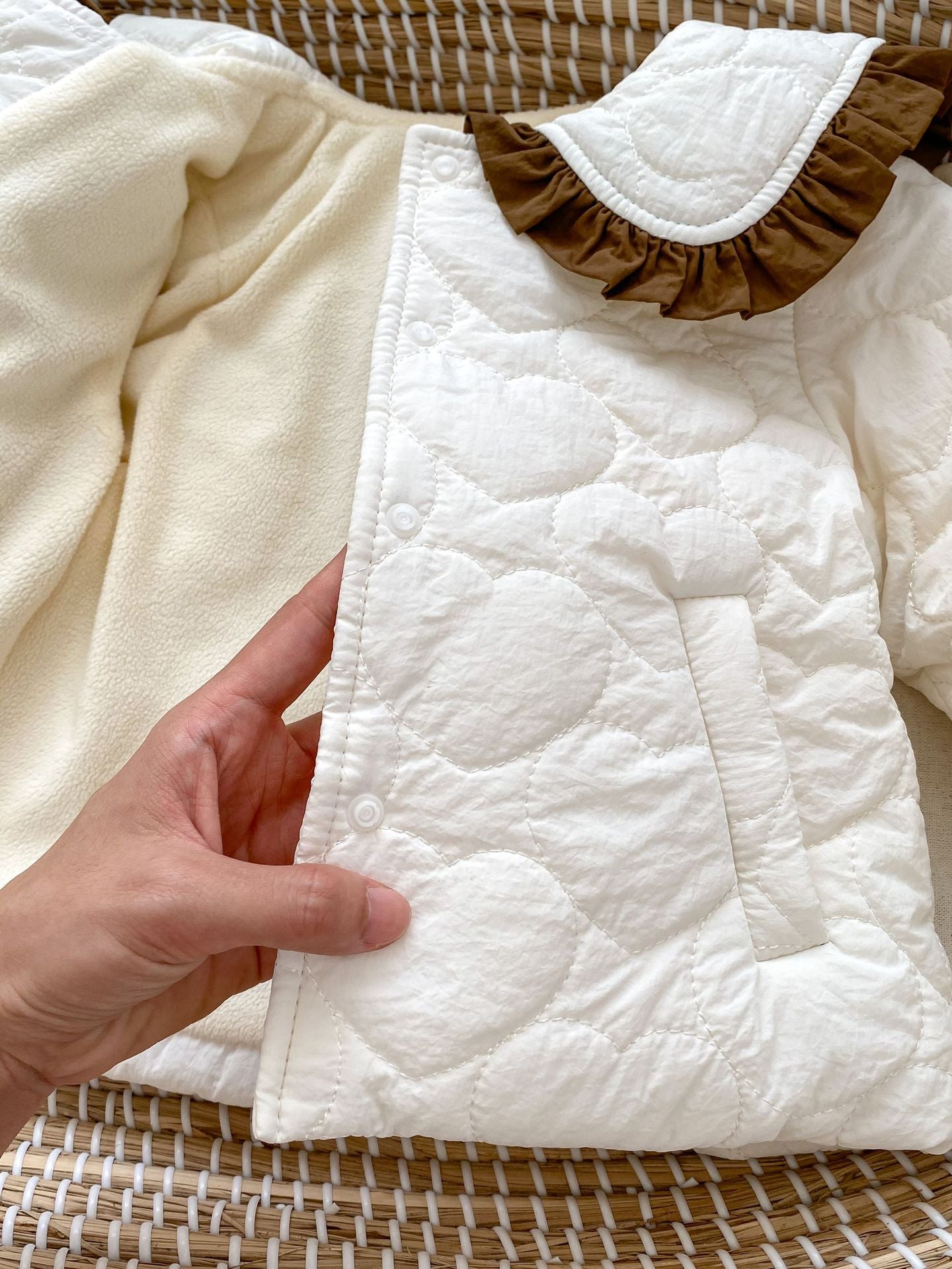 Baby girl beige cardigan coat with bow tie design, thickened long sleeves, perfect for winter wear.